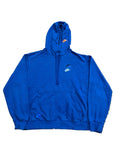 A royal blue Nike pullover hoodie  The hoodie features a small orange and blue Nike logo on the chest, a matching blue logo on the pocket, and a blue swoosh on the left chest.