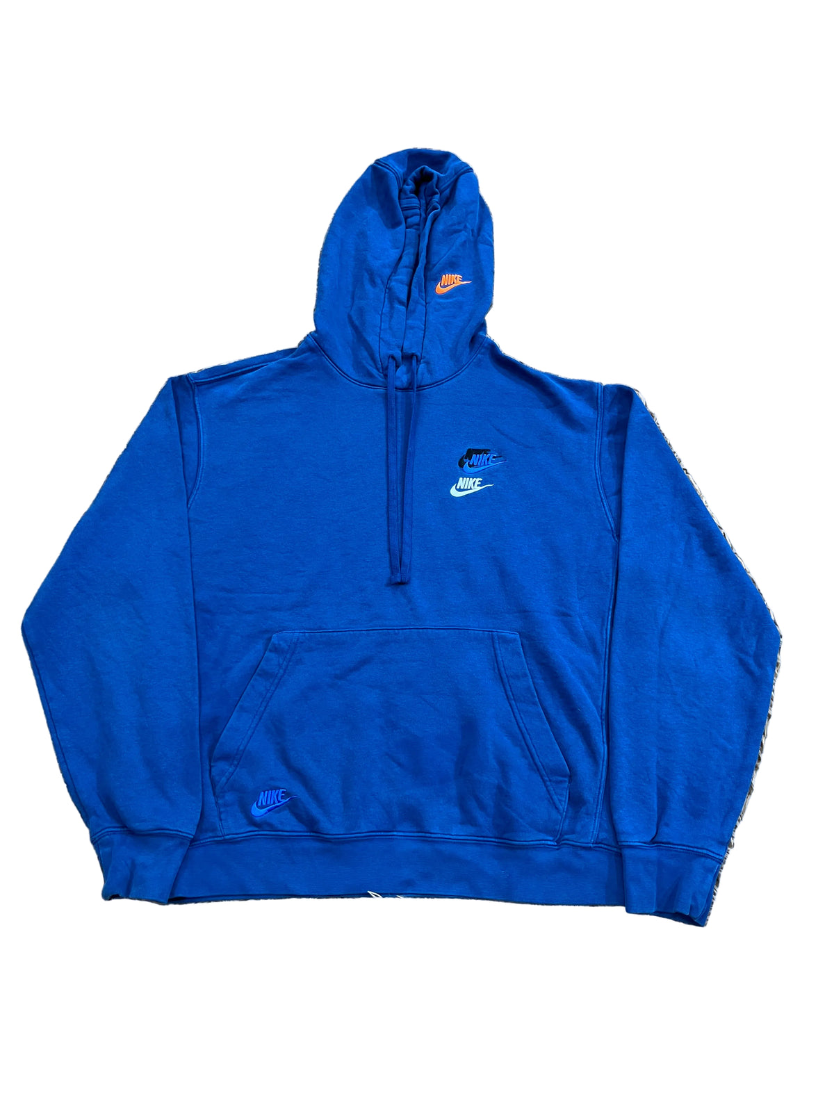 A royal blue Nike pullover hoodie  The hoodie features a small orange and blue Nike logo on the chest, a matching blue logo on the pocket, and a blue swoosh on the left chest.