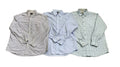 Three men's long-sleeve button-down shirts The left shirt is white with a thin red grid pattern, the center shirt is light blue with a subtle check, and the right shirt is white with a light blue grid pattern.