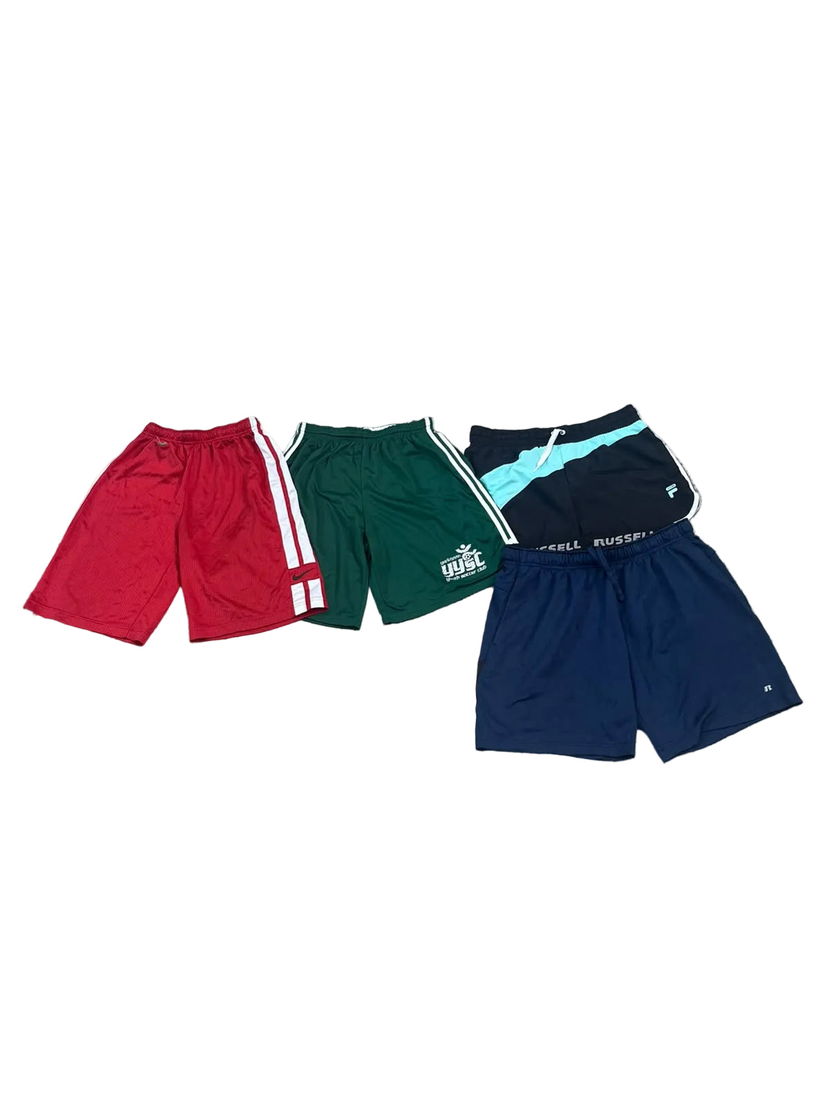Four pairs of athletic shorts  red with white side stripes, green with white side stripes and a white crest logo, navy with a bright turquoise waistband detail, and navy with white side stripes and a small white logo.
