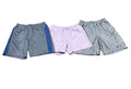 Three pairs of athletic shorts gray shorts with blue side stripes on the left, light lavender drawstring shorts in the center, and gray Nike shorts on the right.