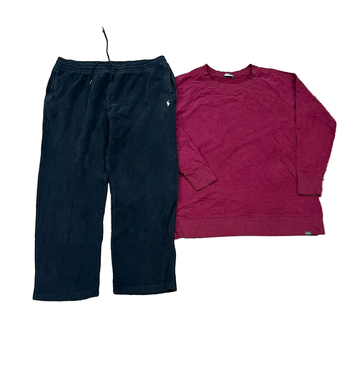 A pair of dark navy jogger pants and a maroon long-sleeve crewneck sweatshirt