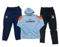 Three athletic apparel items: navy jogger pants with a yellow logo on the left, a light blue Under Armour hooded sweatshirt with orange panels and 'COMBINE' text in the center, and black jogger pants with a crest on the right.