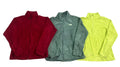 Three lightweight zip-up jackets  a burgundy jacket on the left, a muted sage green jacket in the center with a small white The North Face logo, and a neon yellow jacket on the right.