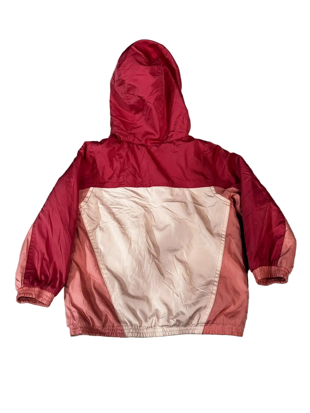 A hooded windbreaker jacket  The jacket features a bright red hood and upper sleeves, with a large light peach-beige color-blocked panel across the lower torso and sleeves, and a muted coral-pink lower section.