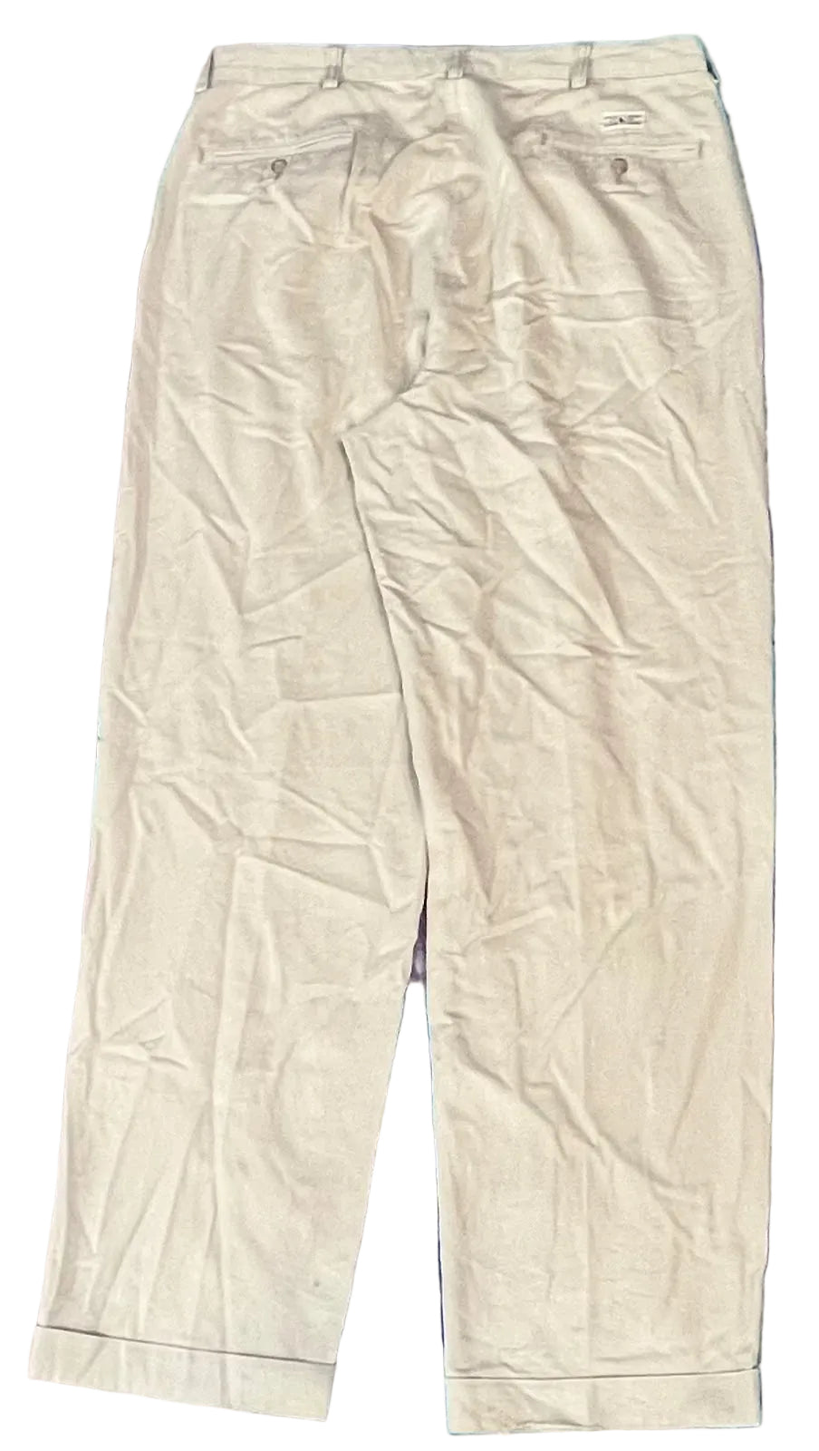 A pair of light beige chino pants