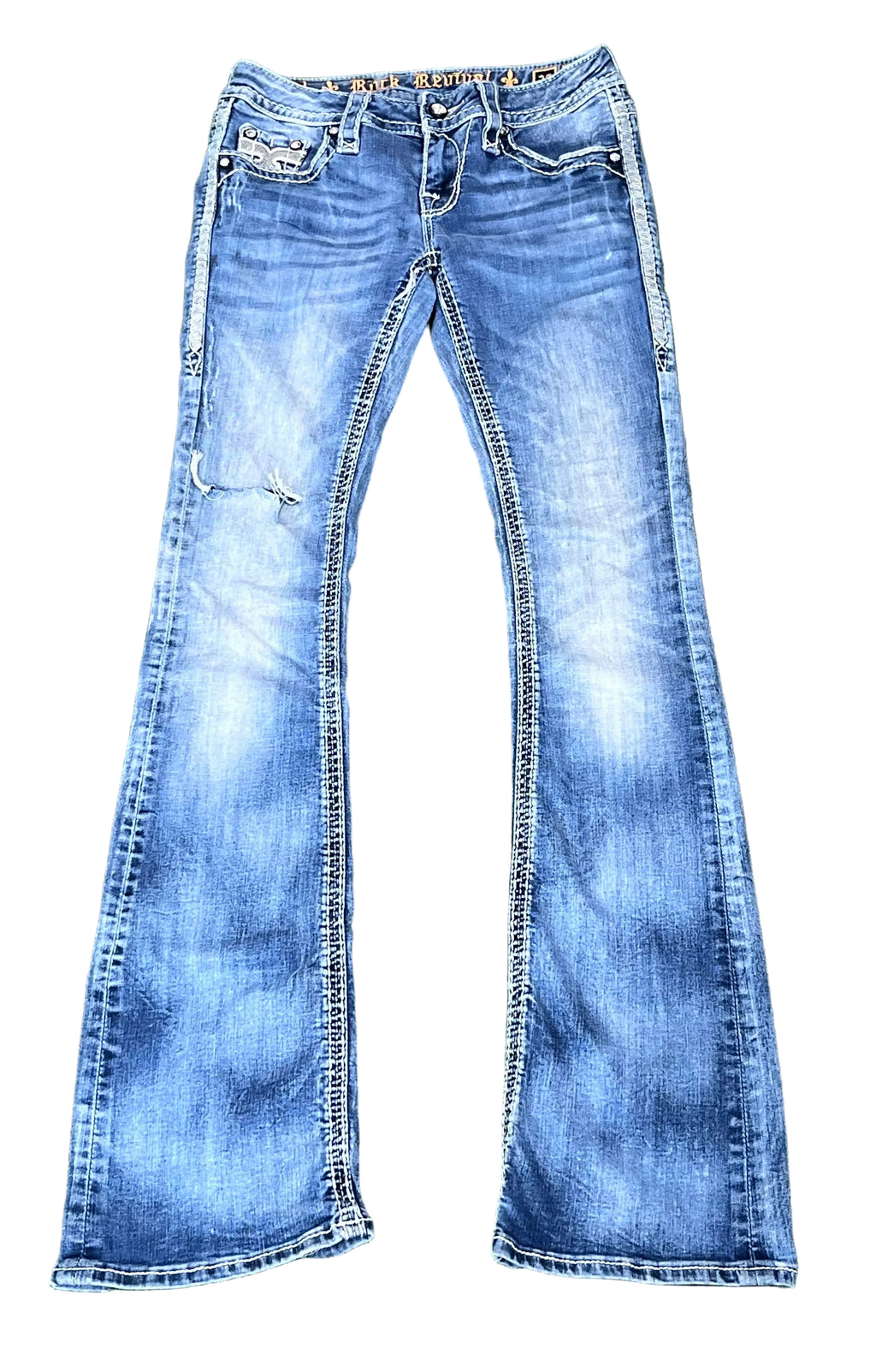 ROCK REVIVAL WOMEN JEANS ON A WHITE PLAIN BACKGROUND 