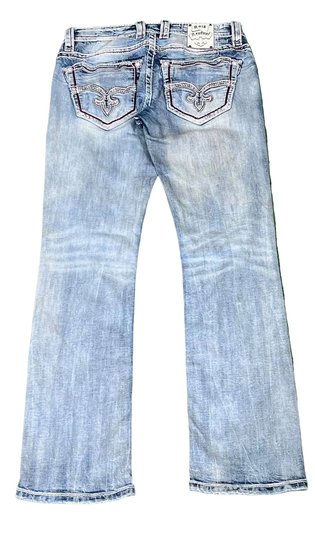 ROCK REVIVAL WOMEN JEANS ON A WHITE PLAIN BACKGROUND 