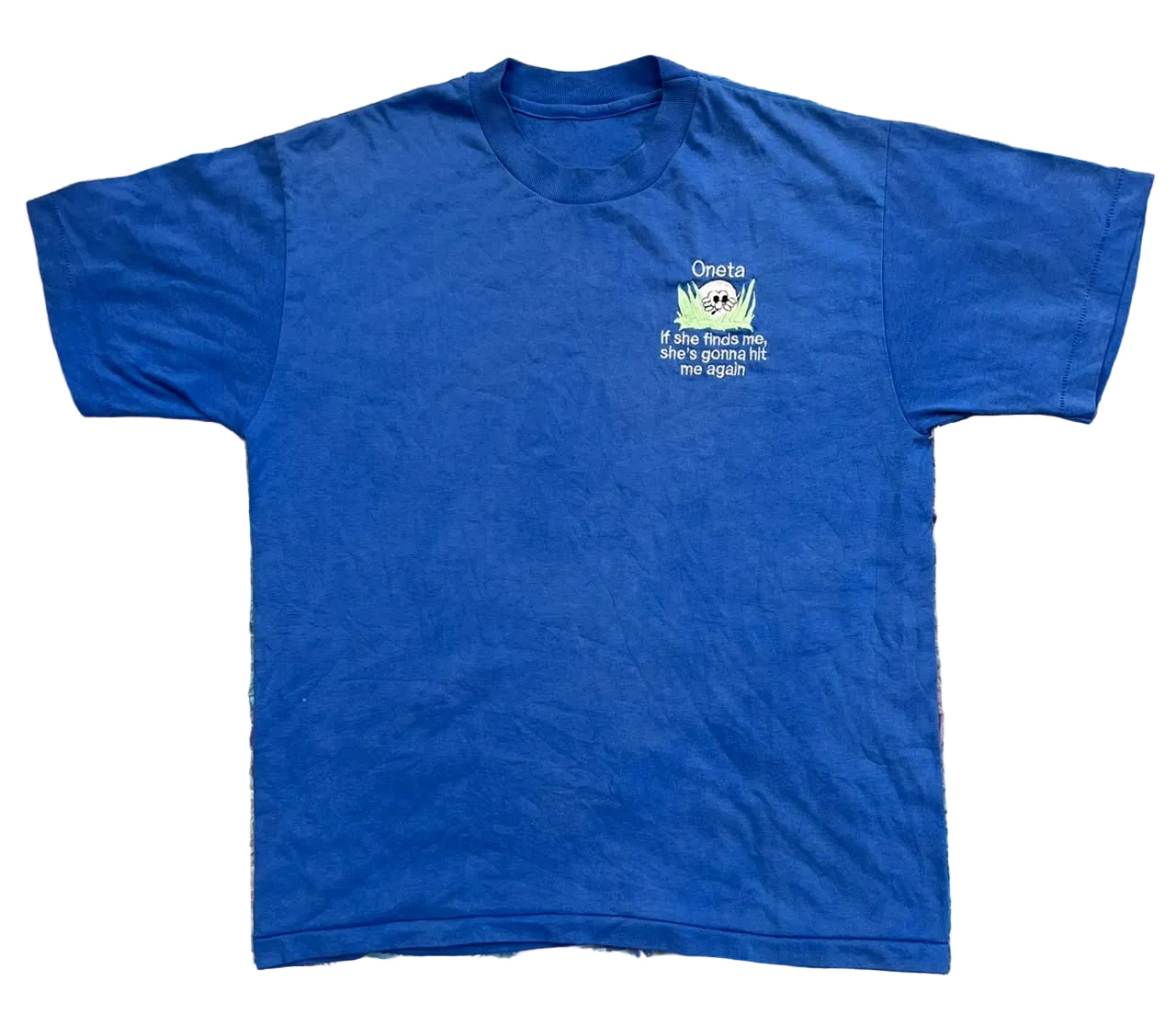 A blue short-sleeve t-shirt with a small graphic and text on the left chest, 