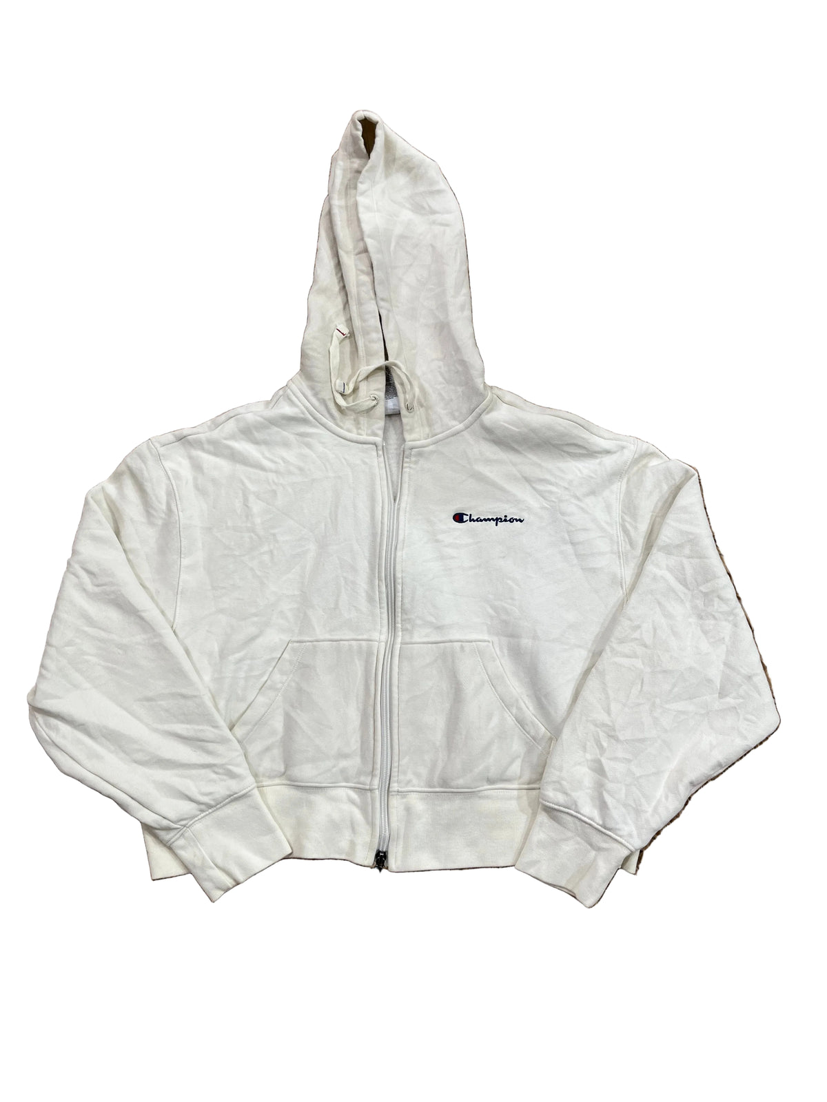 A cream-colored Champion zip-up hoodie . The hoodie features the classic embroidered Champion logo on the left chest.