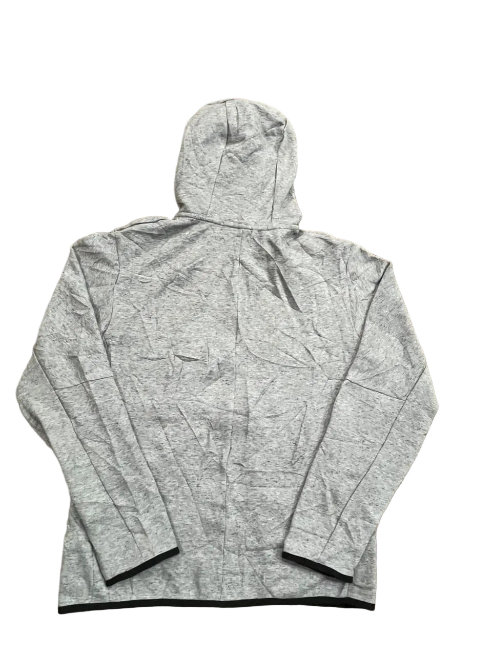 A light gray heathered hooded sweatshirt laid flat on a brown shag rug.