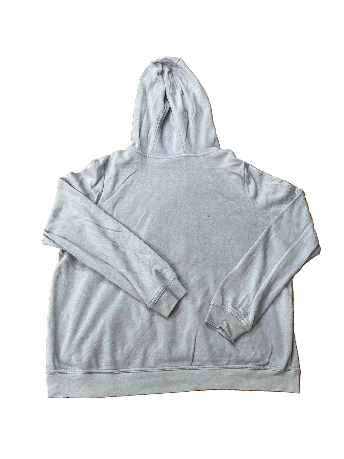 A light gray pullover hoodie  with other clothing items partially visible in the corners.