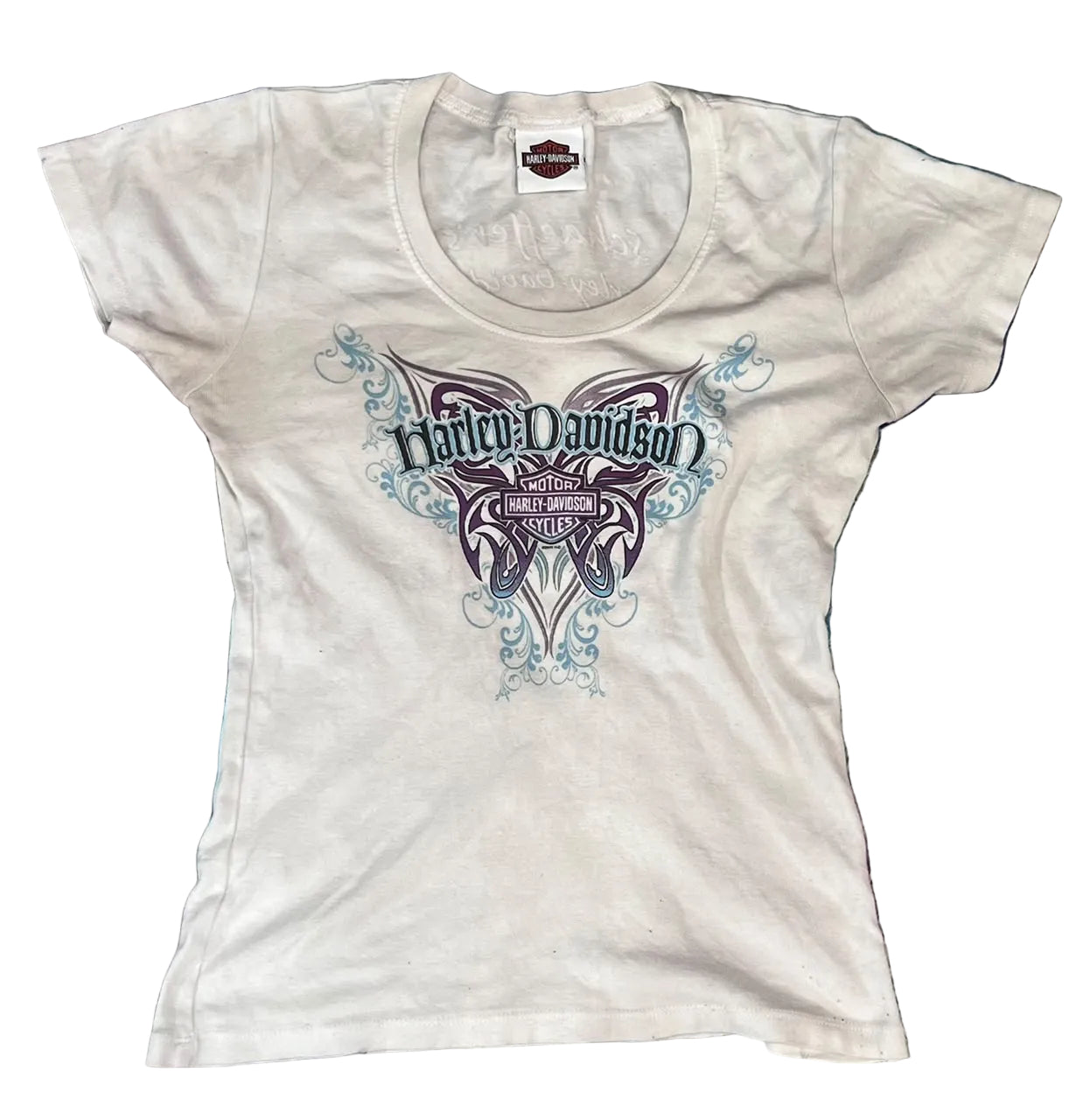 A white Harley-Davidson short-sleeve t-shirt with a large graphic on the front The graphic features a purple and blue butterfly design with the Harley-Davidson logo in the center.