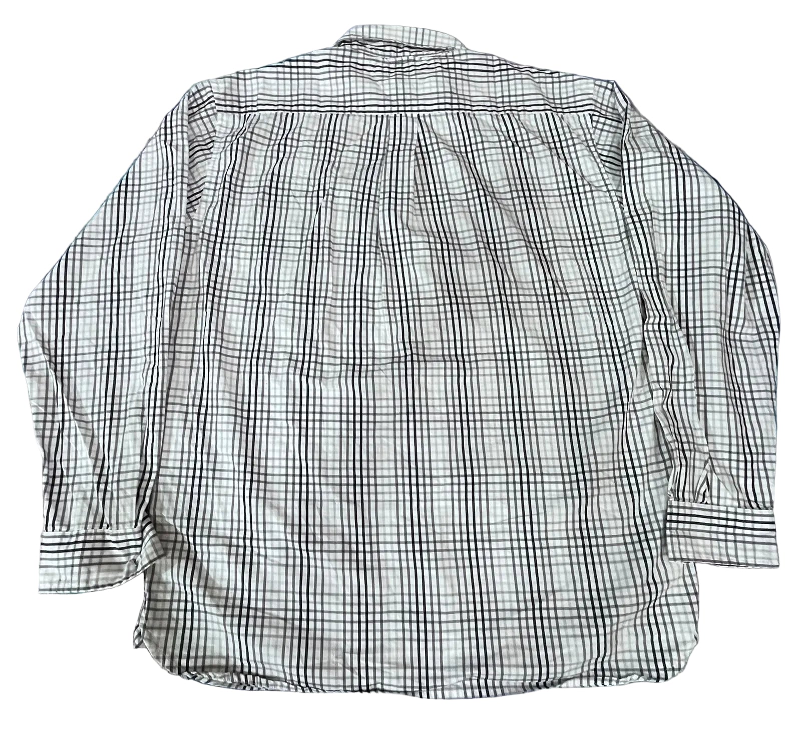 A long-sleeve plaid button-up shirt  The shirt features a white base with a black and gray plaid pattern.