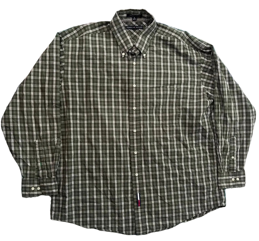 A long-sleeve button-down plaid shirt in dark olive green and black,