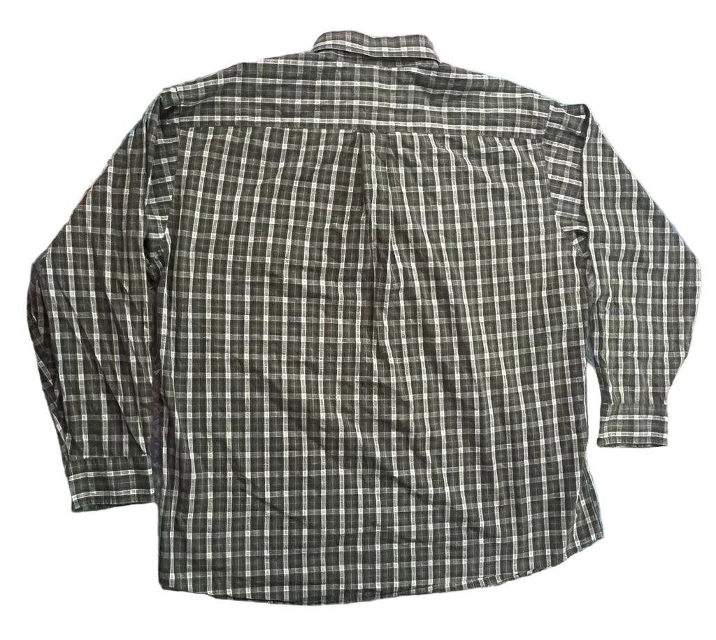 A long-sleeve plaid button-up shirt  The shirt features a dark gray and white checkered pattern.
