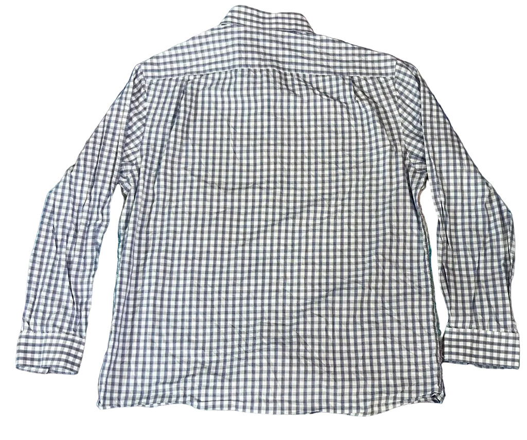 A long-sleeve gingham check shirt. The shirt features a small checkered pattern in black and white.