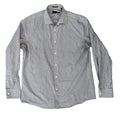 A light gray long-sleeve button-up shirt 