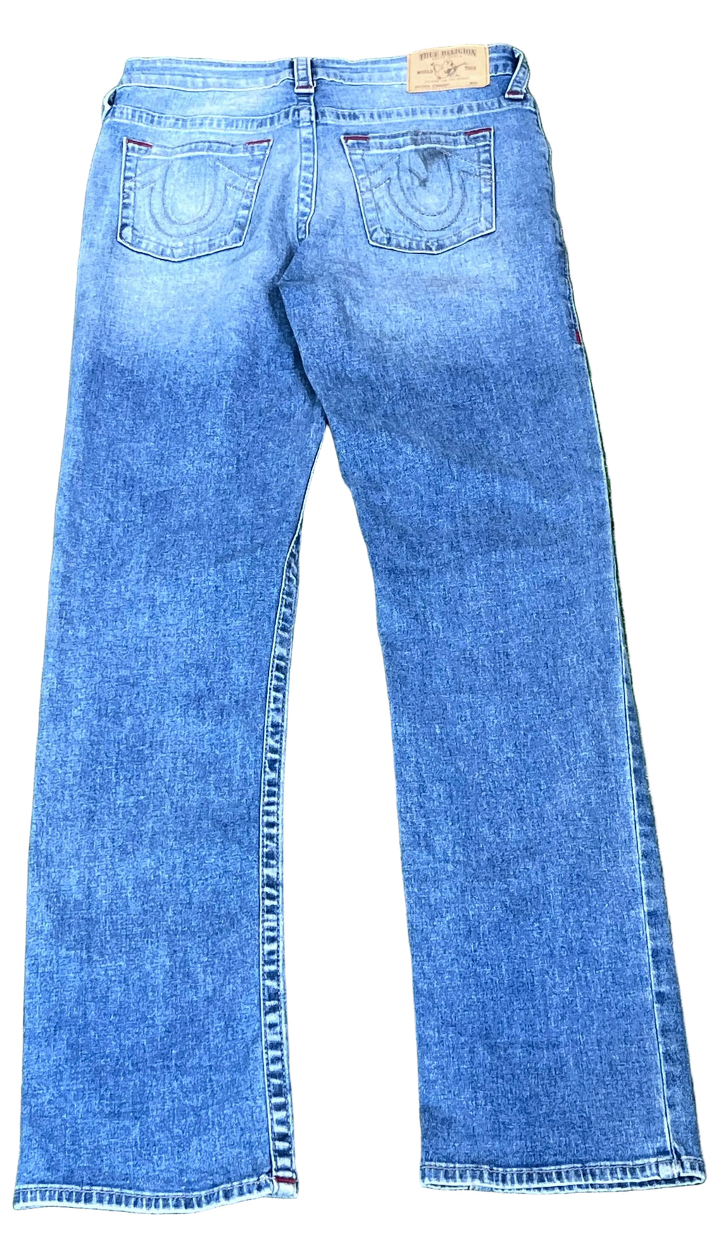 TRUE RELIGION WOMEN JEANS ON A WHITE PLAIN BACKGROUND 