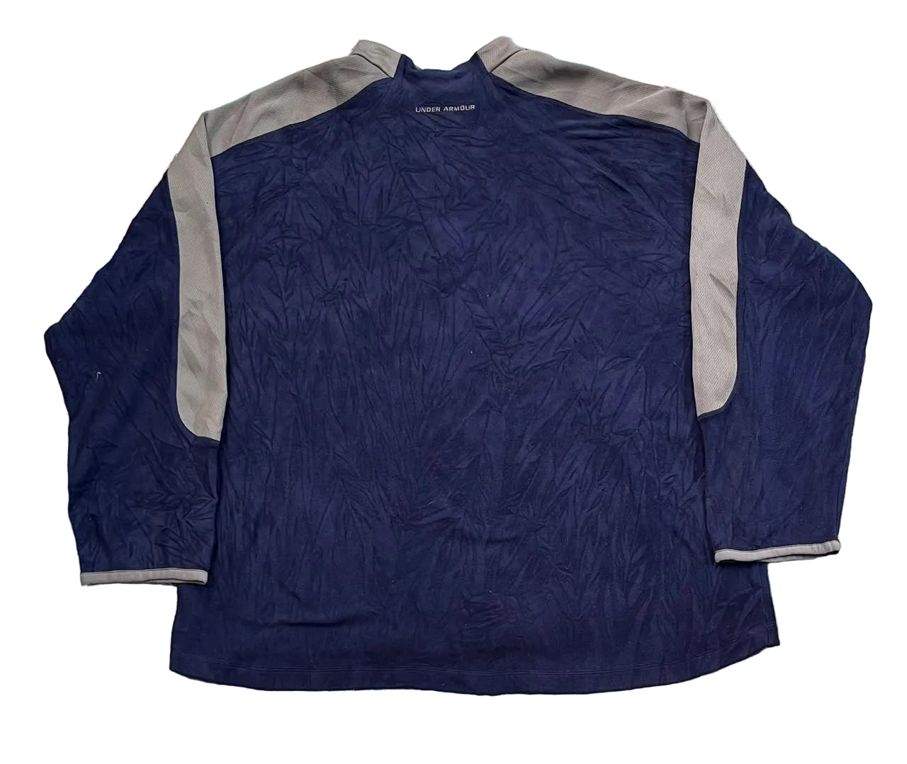 A navy blue long-sleeve athletic shirt with gray shoulder and sleeve panels, The brand name 'PINE RIDGE' is visible on the inner neck label.
