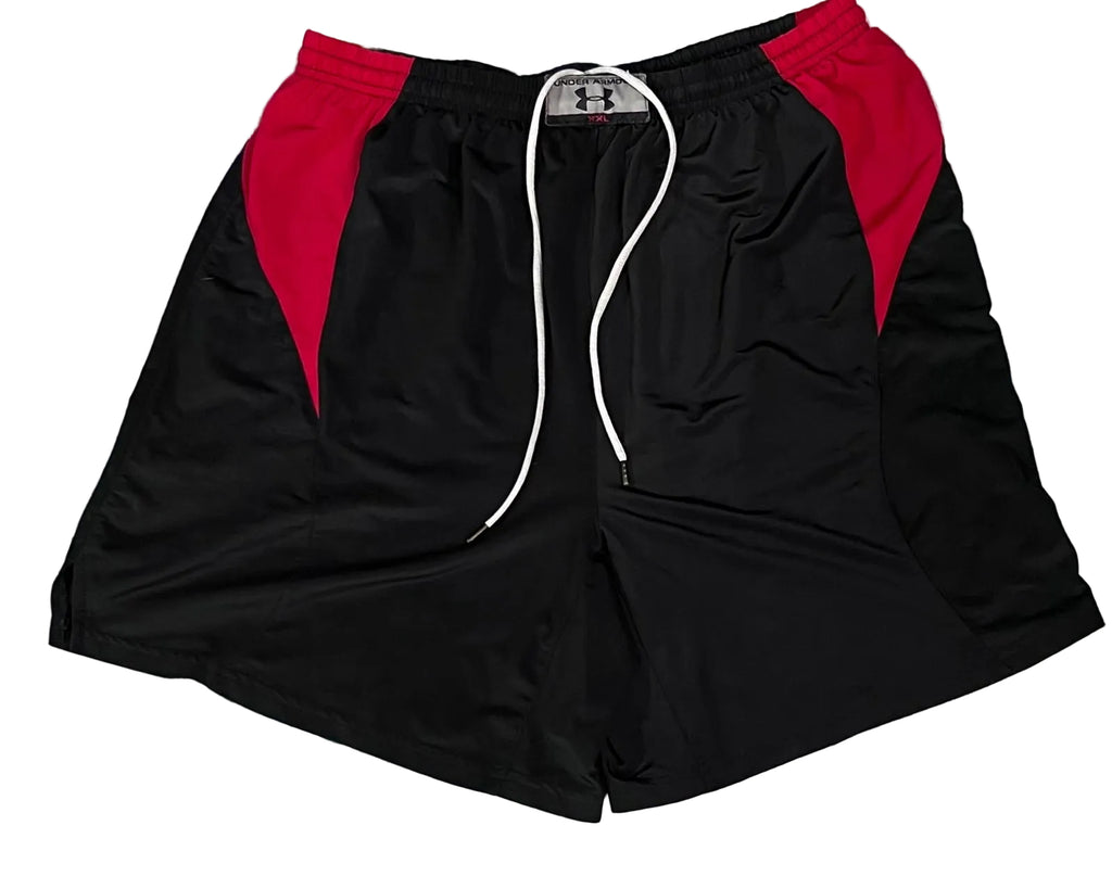 Black athletic shorts with red side panels and a white drawstring