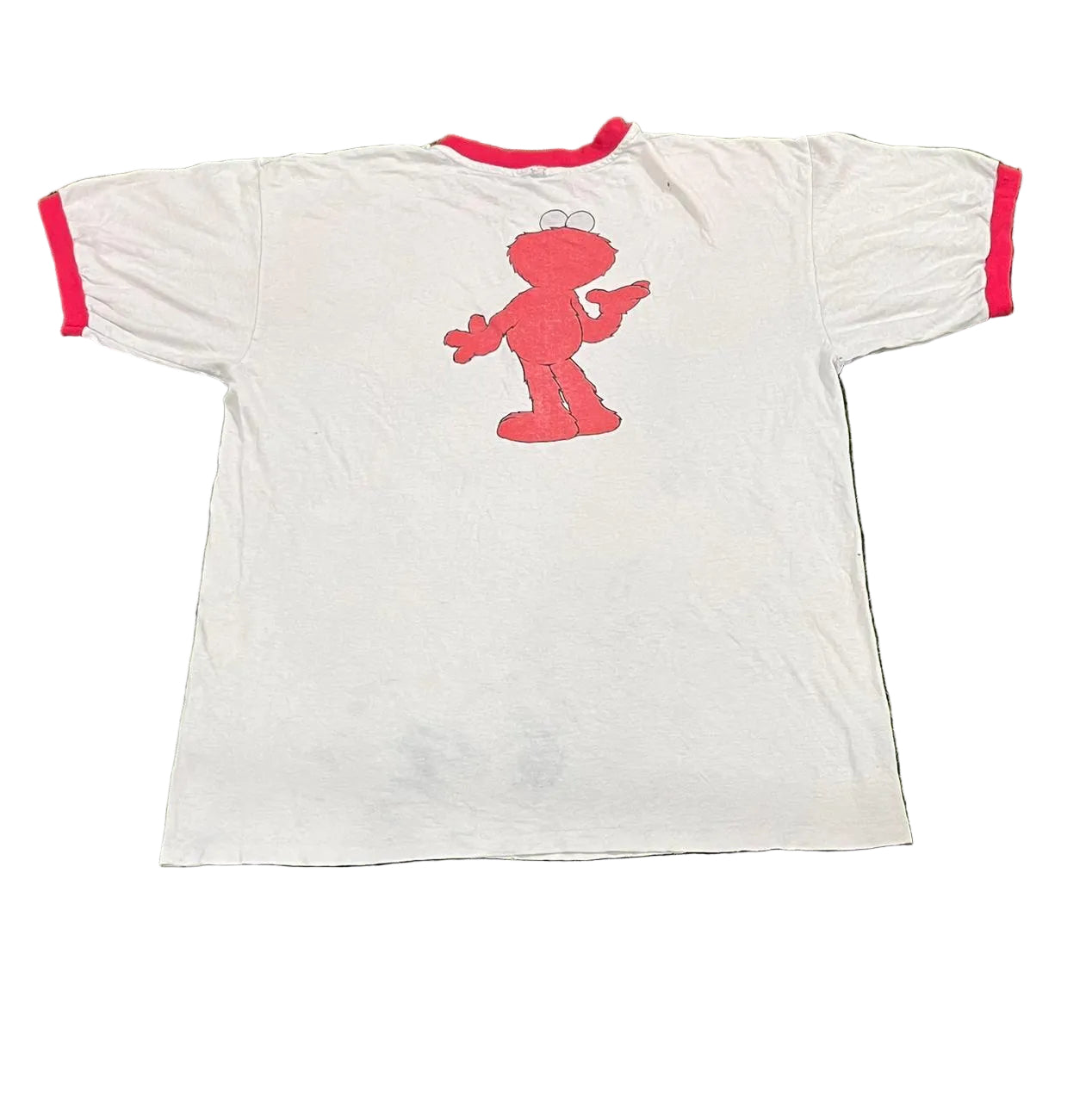 White t-shirt with red character design on a white background