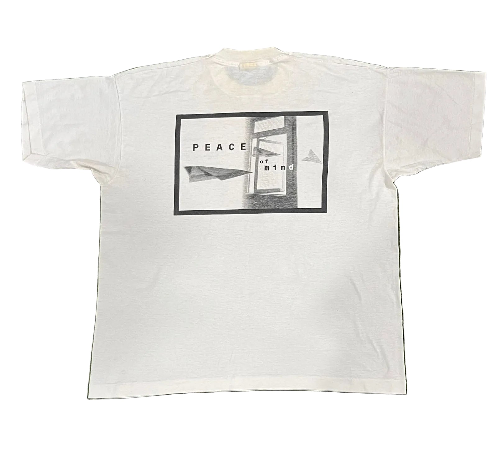 VINTAGE MEN PRINTED T-SHIRT ON A WHITE PLAIN BACKGROUND