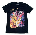 A black short-sleeve graphic T-shirt . The shirt features the words 'MYSTÈRE CIRQUE DU SOLEIL' in gold and white above a large colorful carnival mask illustration with pink, purple, blue, and gold tones.