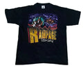 A black short-sleeve graphic t-shirt featuring a colorful front print with the words 'Rampage Visionary!' and an illustrated scene