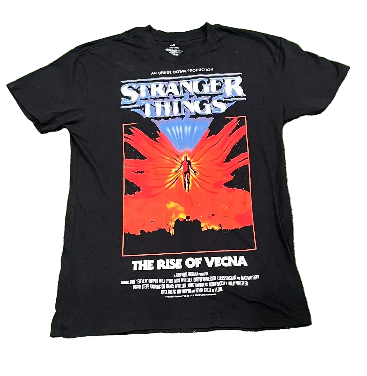 Black t-shirt with 'Stranger Things' graphic design on a white background