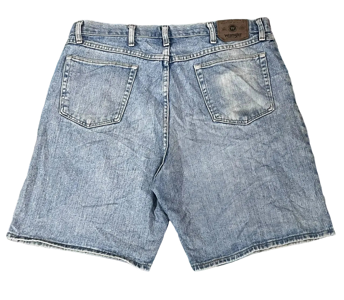 Light-wash blue denim shorts shown from the back,. The back pockets and a brown leather waistband patch are visible.