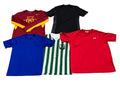 Five athletic t-shirts  a maroon long-sleeve Iowa State shirt with yellow sleeves and chest graphic, a black Adidas shirt, a royal blue Under Armour shirt, a green and white striped soccer jersey, and a red Under Armour shirt.
