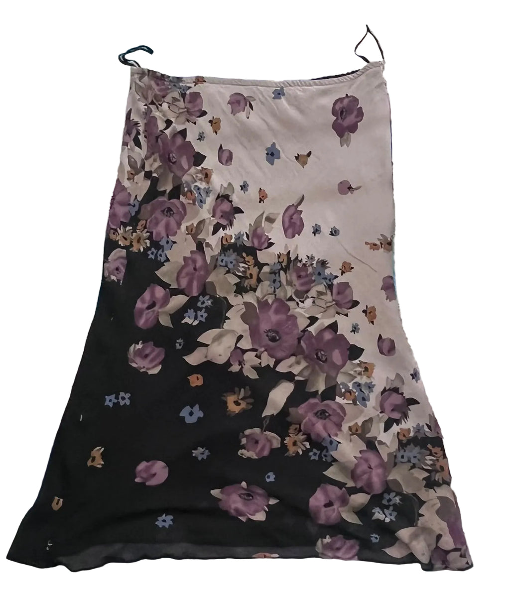 A floral slip dress with a black and beige gradient design, featuring purple and blue flowers, 