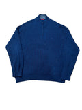 A navy blue cable-knit quarter-zip sweater, with a small red and white tag visible at the collar.