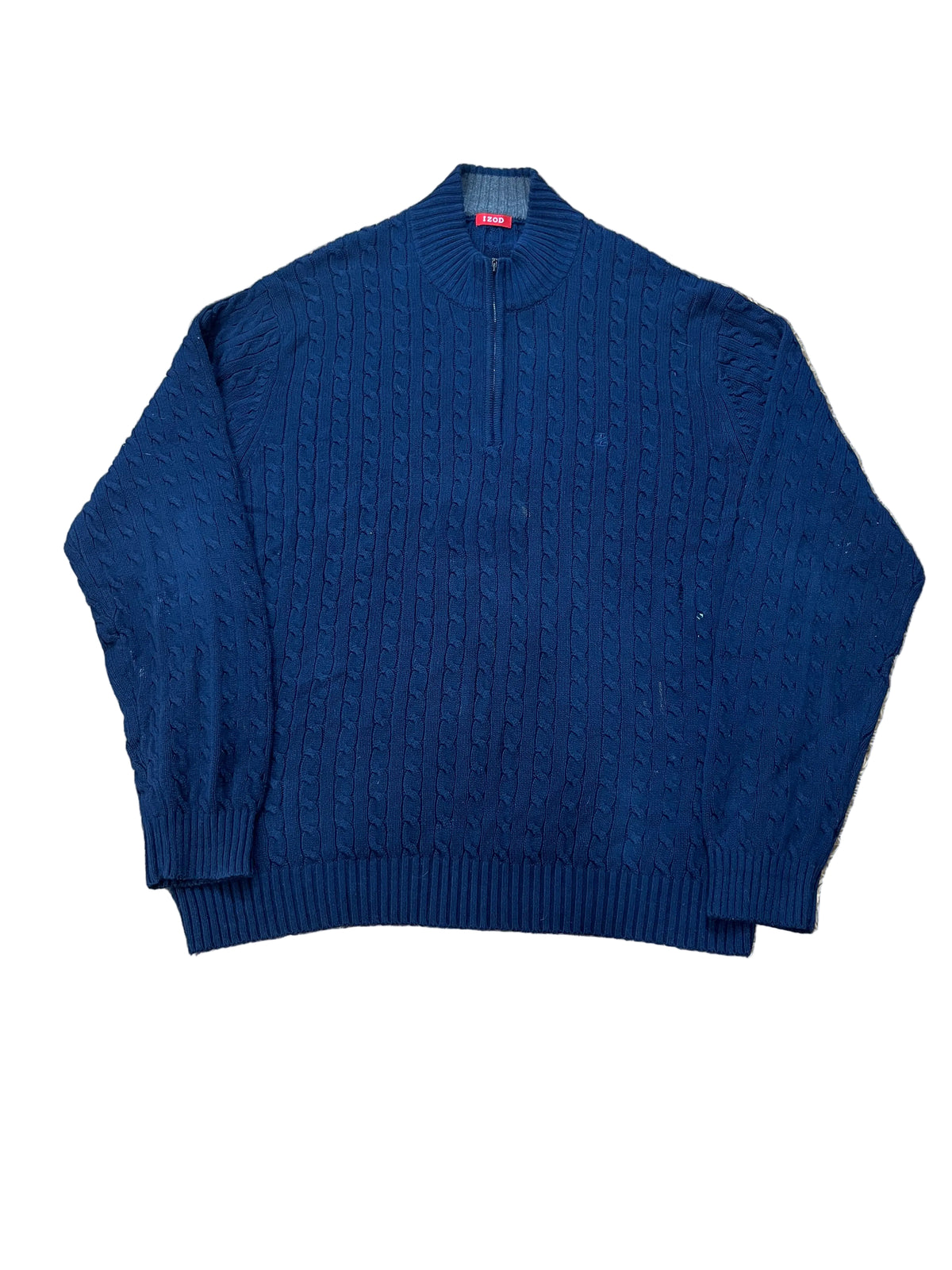 A navy blue cable-knit quarter-zip sweater, with a small red and white tag visible at the collar.