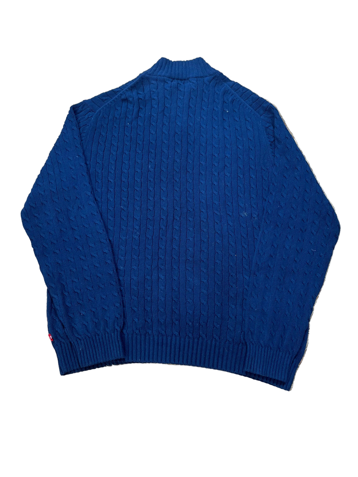 A royal blue cable-knit sweater  showing the back view.