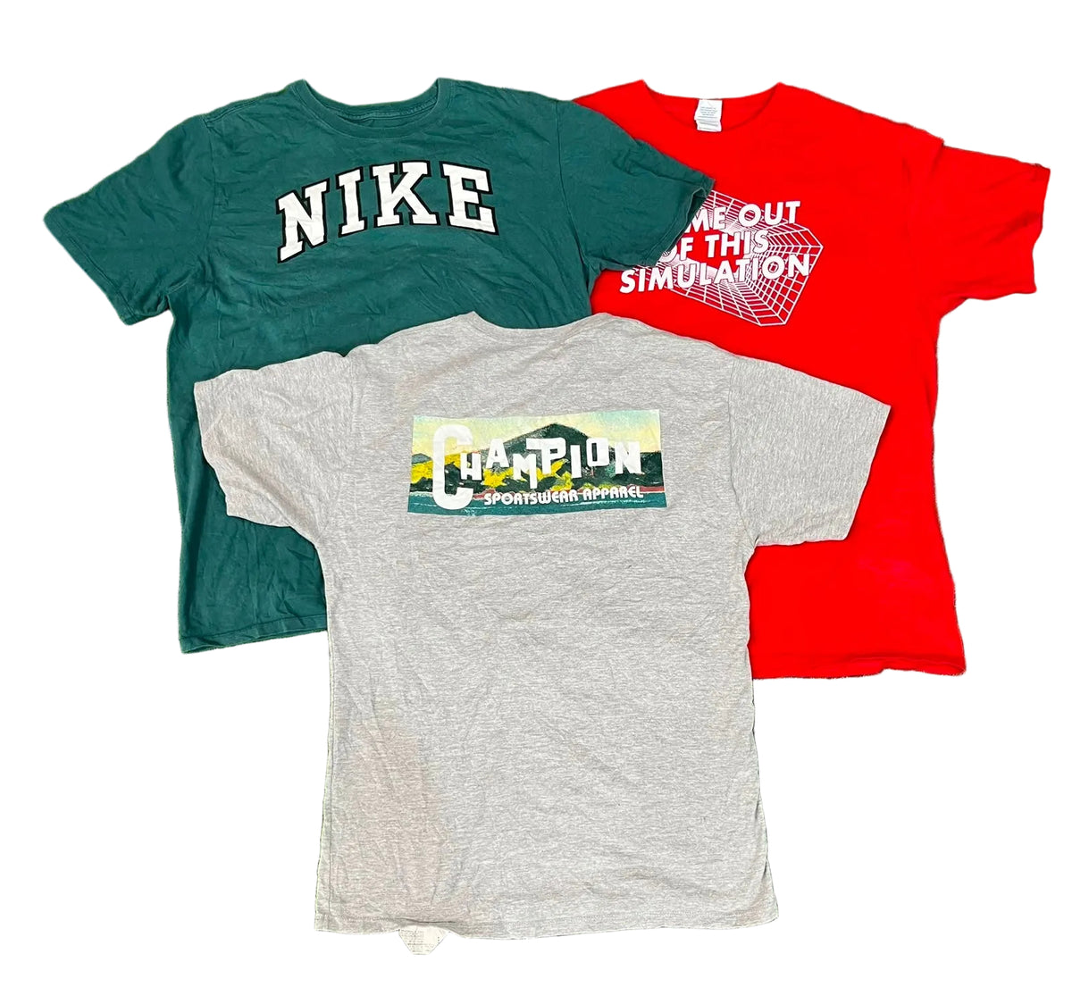 Three vintage graphic t-shirts a dark green Nike t-shirt, a red t-shirt with white text, and a heather gray Champion t-shirt with a colorful sponsor graphic.