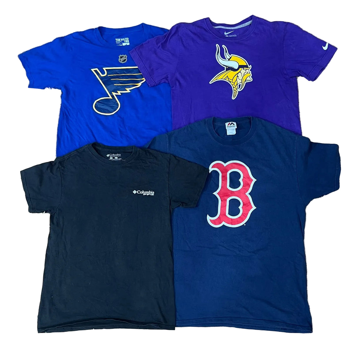 Four vintage short-sleeve graphic t-shirts The set includes a blue St.